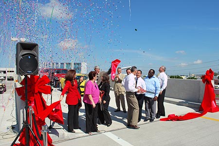 Celebrating the ribbon cutting for the MIA Rental Car Center on July 12 were: Miami-Dade County Mayor Carlos Alvarez; Miami-Dade County Commissioners Jose “Pepe” Diaz, Dorrin D. Rolle and Rebeca Sosa; FDOT Secretary Stephanie Kopelousos; FDOT District 6 Secretary Gus Pego, Greater Miami Chamber of Commerce Chairwoman Maria C. Alonso; Beacon Council Chairwoman Alexandra Villoch; Greater Miami Convention and Visitor Bureau Chairman Steve Haas; Turner Construction Vice President Jay Fraser; Miami-Dade County Manager George M. Burgess; and Miami-Dade Aviation Director José Abreu.