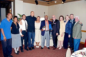 Pictured from left to right: Simpson family members with MIA Volunteer Ambassador of the Year winner Ray Simpson; MDAD Aviation Director Jos&eacute; Abreu; Assistant County Manager Ysela Llort; MDAD Terminal Operations and Customer Service Division Director Dickie Davis; MDAD Deputy Director of Operations Ken Pyatt; and GMCVB President and CEO Bill Talbert.