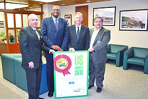Miami-Dade Aviation Department Director Jos&eacute; Abreu, Deputy Directors Miguel Southwell and Ken Pyatt, and Marketing Division Director Chris Mangos with MIA&rsquo;s 2010 ANNIE Prize for Airport With The Most New International Routes.